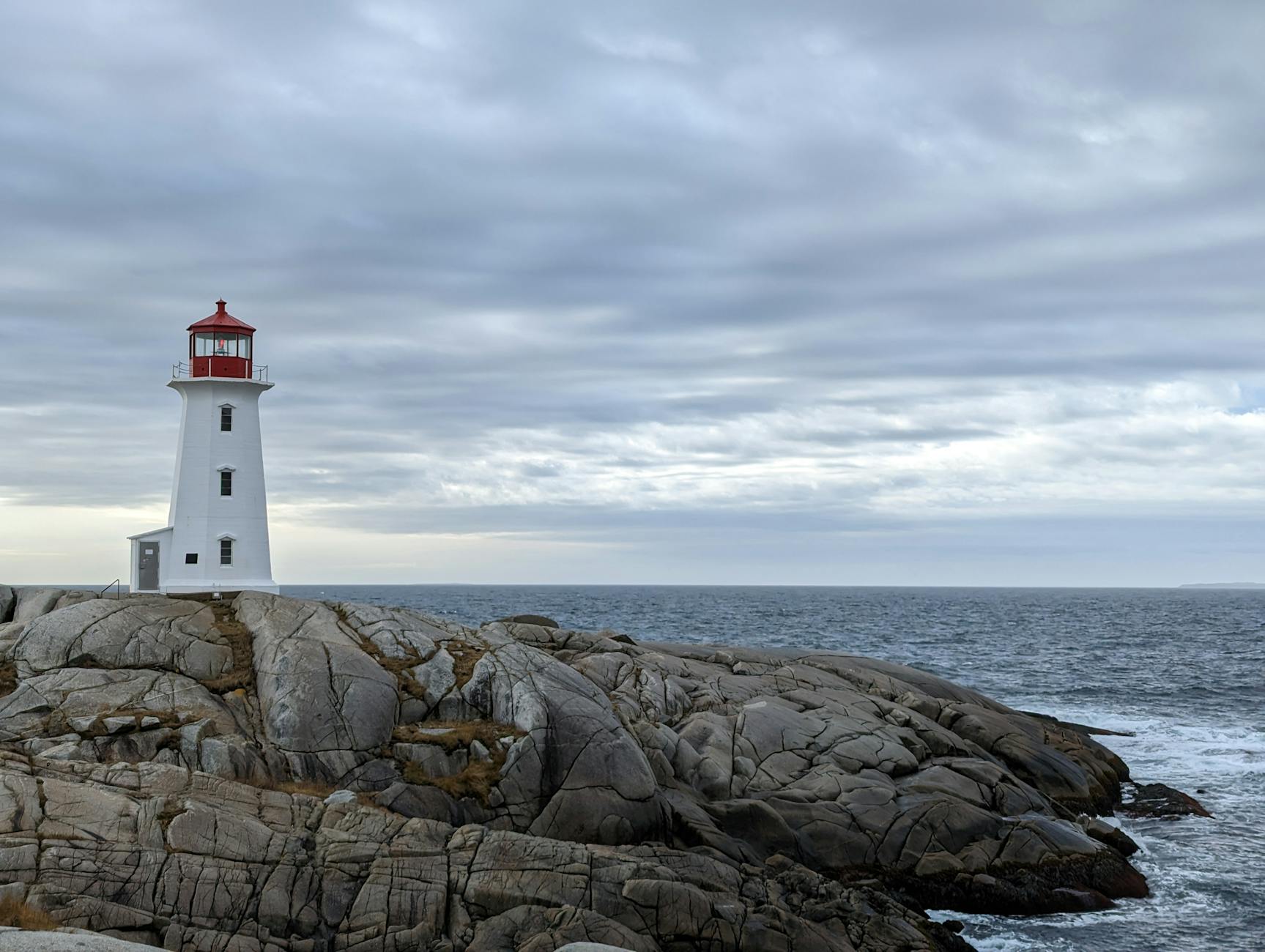 lighthouse on rocky seashore